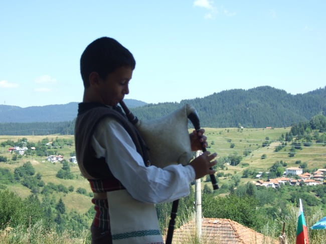 Young bagpipe player in Gela